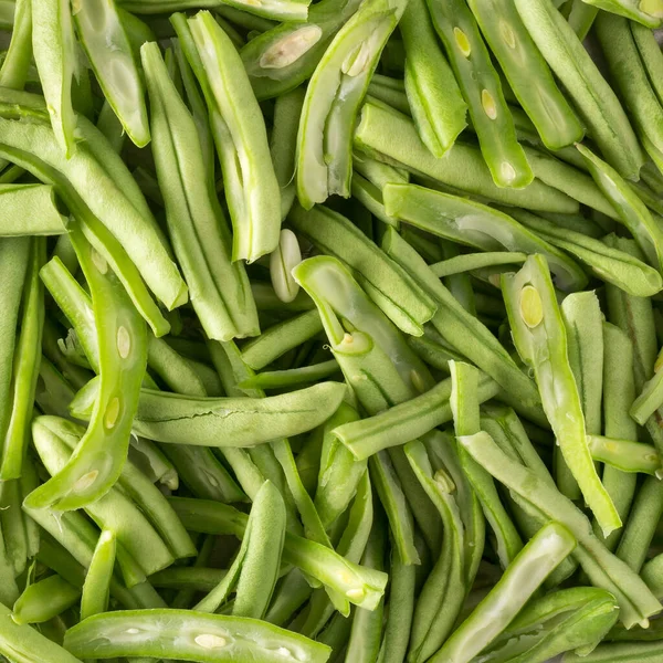 カットされ きれいにされた緑の豆の山 フランス豆として知られている 文字列豆やスナップ 調理のための野菜 食品の背景 — ストック写真