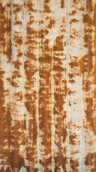 aged and rusted corrugated metal roofing sheet background texture, old rustic roof surface backdrop for photography
