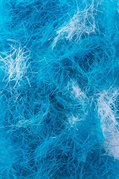 abstract pattern of tangled threads, blue and white color background texture, closeup