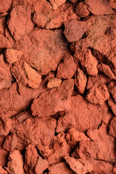 红粘土土的抽象物 铜氧化物含有深红色色调的岩石 特写背景 从上方取材 — 图库照片