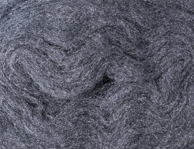 Çelik tel yünü yakın plan, cilalama için ince aşındırıcı malzeme, yüzey arka plan, doku