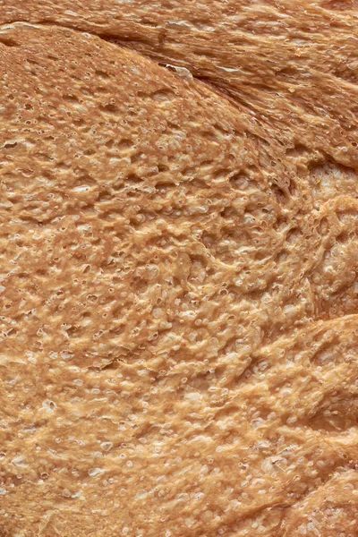 フルフレームでパンの皮の表面 多くの文化で人気の食品やサンドイッチを作るために使用 トースト その他の料理 明るい色と柔らかい食感食品の背景 — ストック写真