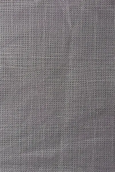 close-up of gray non-woven fabric material surface, abstract of washable, durable and made directly from fibers that are bonded together, background texture in full frame