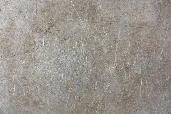 Eski, kirli, çizilmiş metal yüzey zemininin soyutlanması, yıpranmış gri desenli alüminyum veya gümüş, kırsal duvar kağıdı veya grafik tasarımı için arkaplan