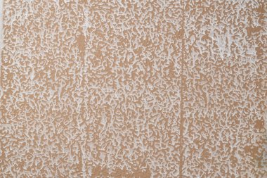 Seramik zemin fayanslarının arka yüzeyi, yapı veya yapı malzemesi tasarımının soyut yapısı, beyaz ve kahverengi renkler rastgele şekilli.