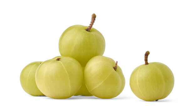 fresh amla or indian gooseberry isolated white background, small greenish yellow fruit with high vitamin c and health benefits in traditional ayurveda medicine