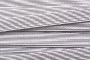 close-up of white knitted elastic bands abstract background, commonly used in textile industry garments, sportswear and lingerie clipart