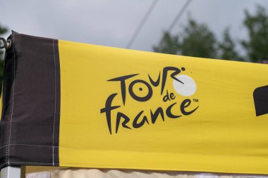 Tour of France: tour logo. A world-famous cycling race, involves professional cyclists who compete in spectacular stages through picturesque landscapes, mountains, sprints, time trials, yellow jerseys, effort, strategy, emotions and victory. news clipart