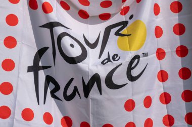 Tour of France: tour logo. A world-famous cycling race, involves professional cyclists who compete in spectacular stages through picturesque landscapes, mountains, sprints, time trials, yellow jerseys, effort, strategy, emotions and victory. news clipart