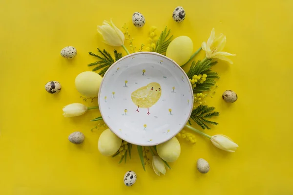 Easter Composition Yellow Tulips Eggs Cookies Yellow Background — Zdjęcie stockowe
