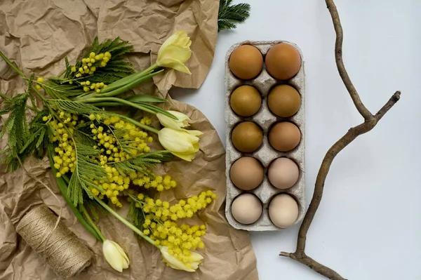 Unfolded Bouquet Tulips Kraft Paper Eggs Paper Egg Holder White — Stock Photo, Image