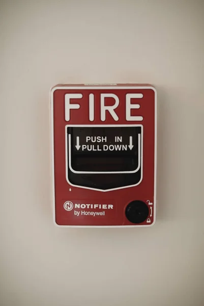 emergency fire alarm clock on a wall