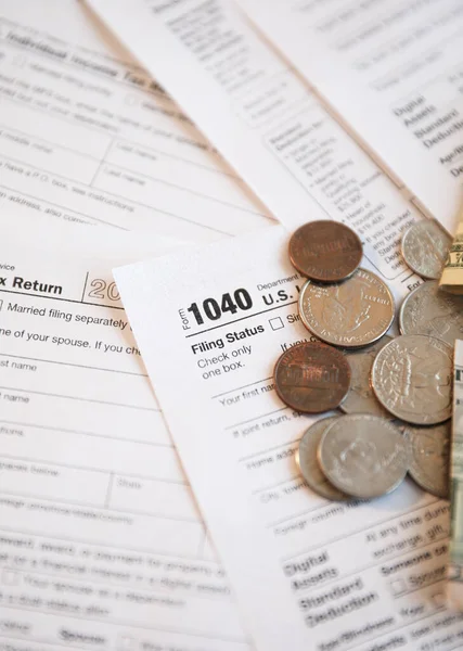 Tax Form 1040 Coins Stock Photo