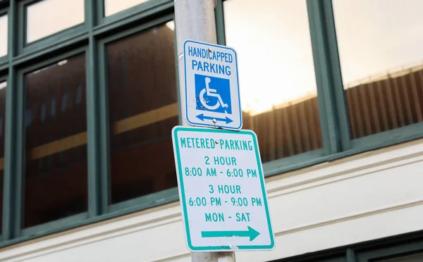 The handicap sign is a blue and white symbol of accessibility. It represents the need for barrier-free access for individuals with disabilities, ensuring their equal participation in society.