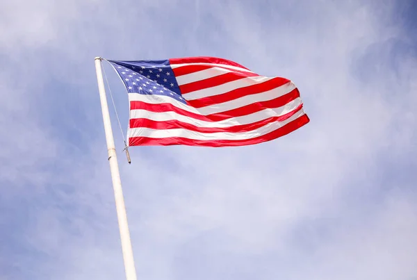US flag symbolizes American patriotism, freedom, and unity a reminder of our shared history, sacrifices, and values. It stands for democracy, liberty, and justice for all.