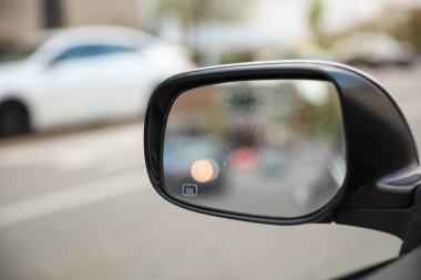 Reflecting on life's journey with the car mirror. A powerful symbol of self-reflection, awareness, and the ability to look back and move forward clipart