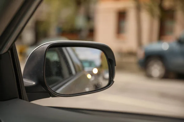 Reflecting on life\'s journey with the car mirror. A powerful symbol of self-reflection, awareness, and the ability to look back and move forward
