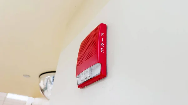 Fire alarm symbolizes safety, emergency preparedness, early warning, and protection against fire hazards