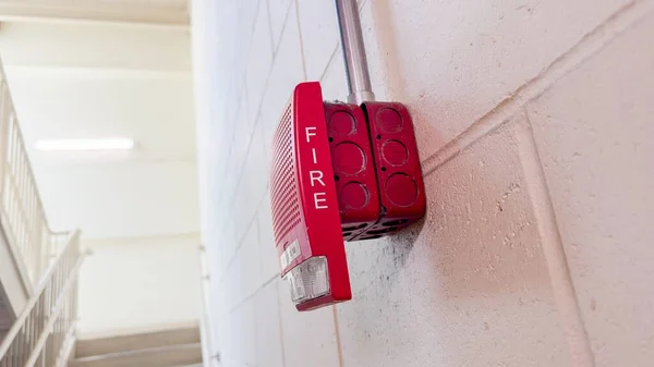 Fire alarm symbolizes safety, emergency preparedness, early warning, and protection against fire hazards