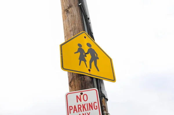 Vibrant Yellow Pedestrian Sign Stands Tall Symbolizing Safety Alertness Importance — Stock Photo, Image