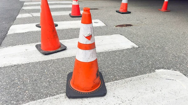 Bright Orange Construction Cones Arranged Line Symbolizing Safety Caution Ongoing — Stock Photo, Image