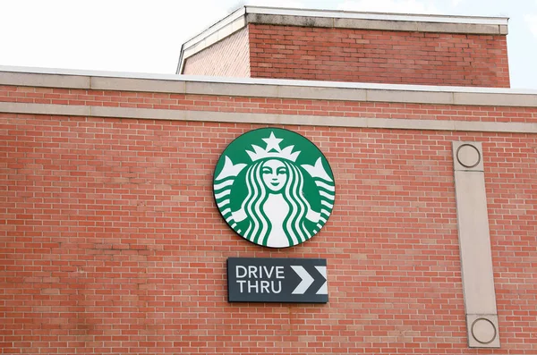 Starbucks Sign City — Stock Photo, Image