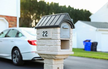 new home mailbox with a brick house clipart