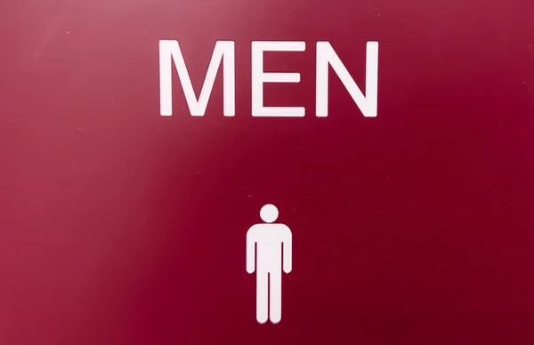Beyaz Arka Planda Adam Tuvalet Işareti Yakın Plan — Stok fotoğraf