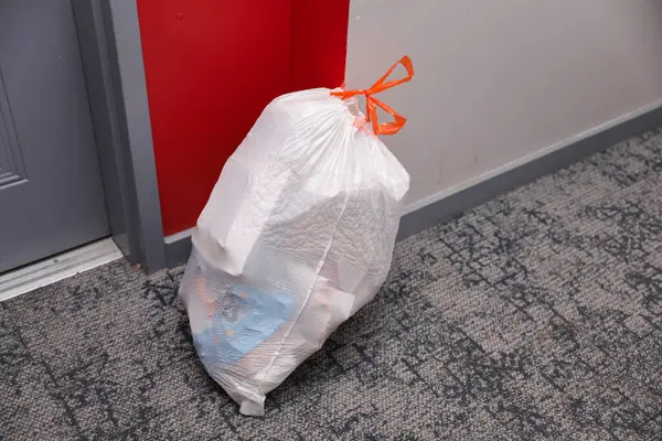 Bag Garbage Bags Floor Brick Wall Apartment — Stock Photo, Image