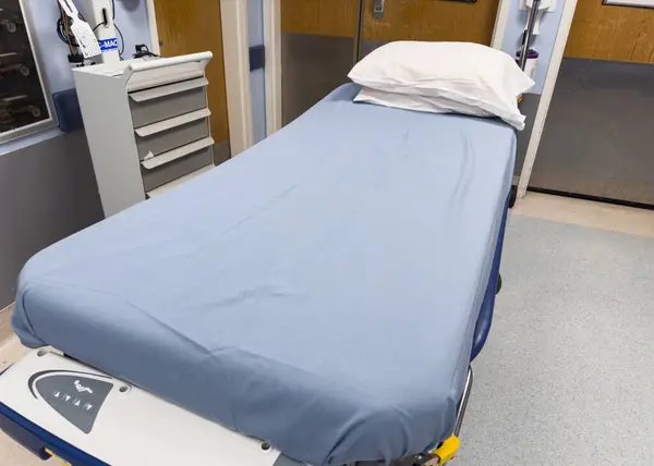 hospital bed in hospital room