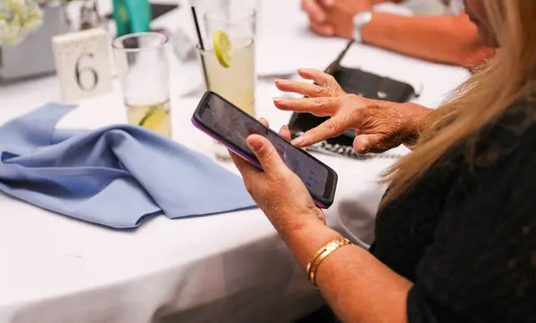 woman in restaurant at a restaurant with a tablet