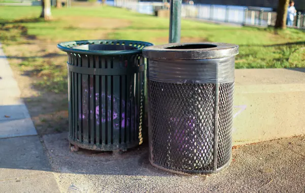 plastic trash cans in the city park