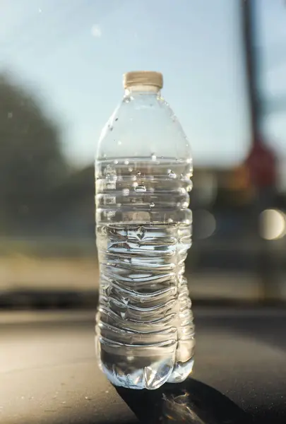 empty bottle of water with blurred background