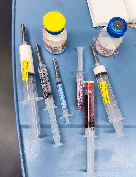 syringe, blood and test tube for injection in laboratory