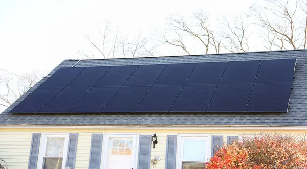 solar panels on a roof of the house. solar panels on a roof of a house. solar panels on the roof. solar panels. the