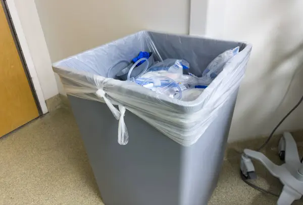 recycling bin in a trash bin