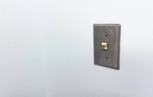 electrical plug on wall in white room
