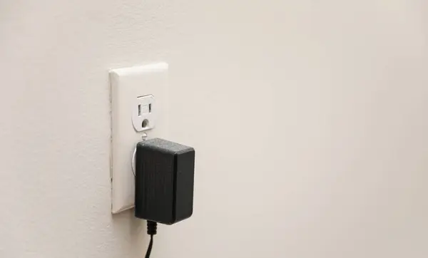 electric plug in the wall