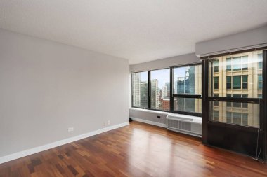 Pencerelerinde şehir manzarası olan boş bir oda. İç dizayn. 3d oluşturma 