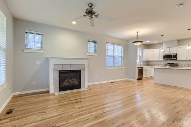 Boş oturma odası, şömine ve mutfak. İç dizayn. 3d oluşturma 