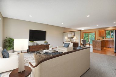 Kanepe ve sandalyeli modern oturma odasının içinde.