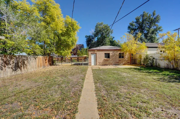 stock image old wooden house in the park, 3d rendering design