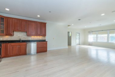 Mutfağı olan boş, modern bir oturma odası. 3d oluşturma 