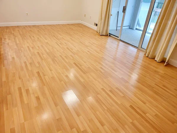 stock image empty wooden parquet floor in a new apartment house.