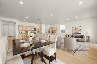 Masası ve mobilyası olan modern oturma odası.