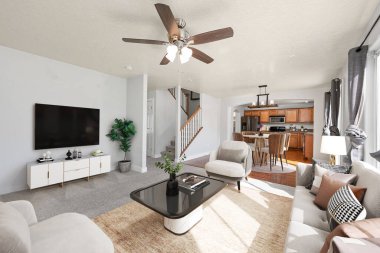 modern oturma odasının içi koltuk ve sandalyelerle dolu.