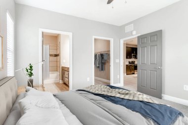 Rahat yatağı olan modern bir yatak odası. 3d oluşturma