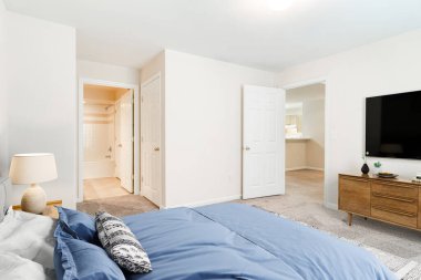 Rahat yatağı olan modern bir yatak odası. 3d oluşturma