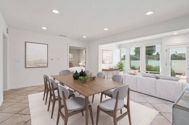 Modern bir dairede masa ve sandalyeli yemek odası. 3d oluşturma