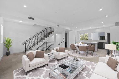 Kanepesi ve masası olan modern oturma odasının içinde. 3d oluşturma